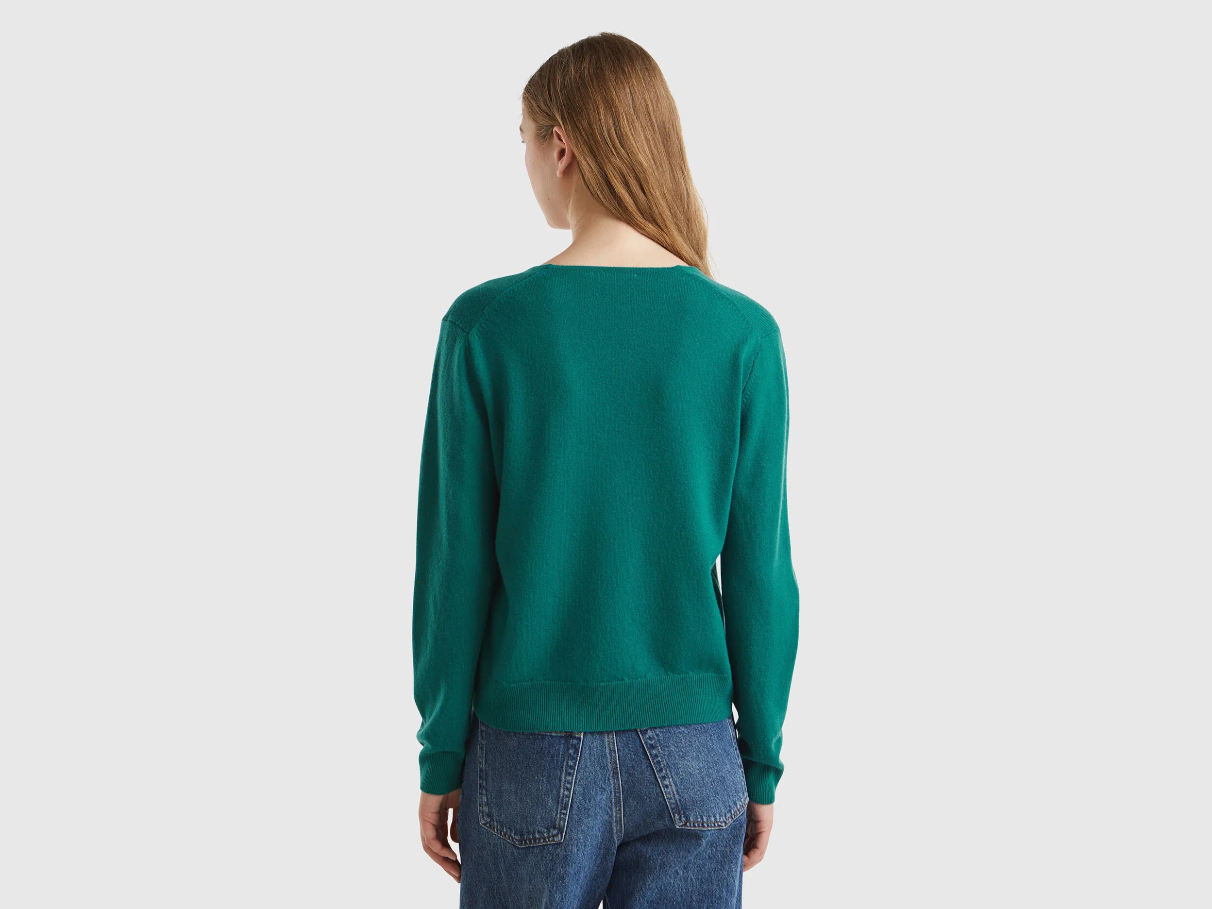 Forest green V-neck sweater in pure Merino wool - Dark Green | Benetton